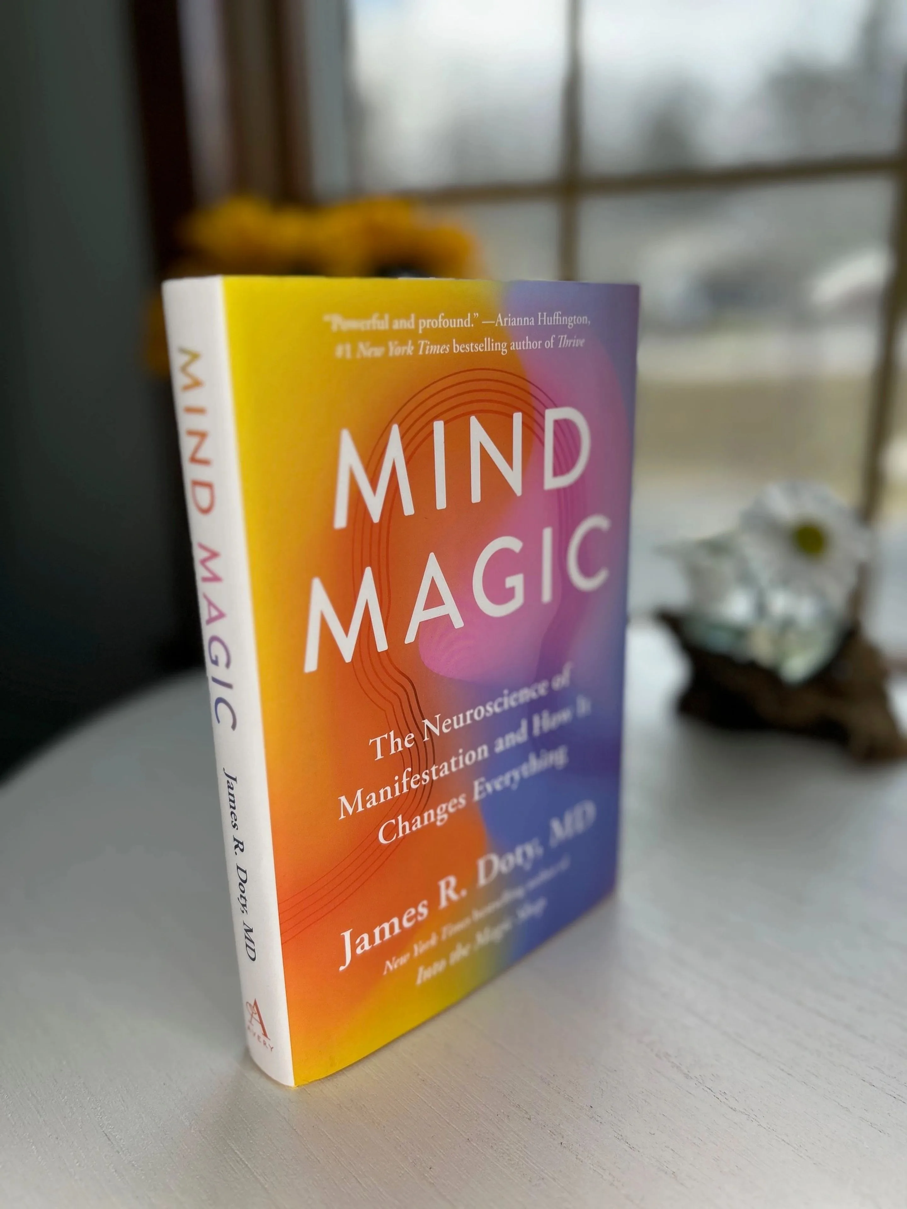 Mind Magic by Dr James Doty beside the clinic window.