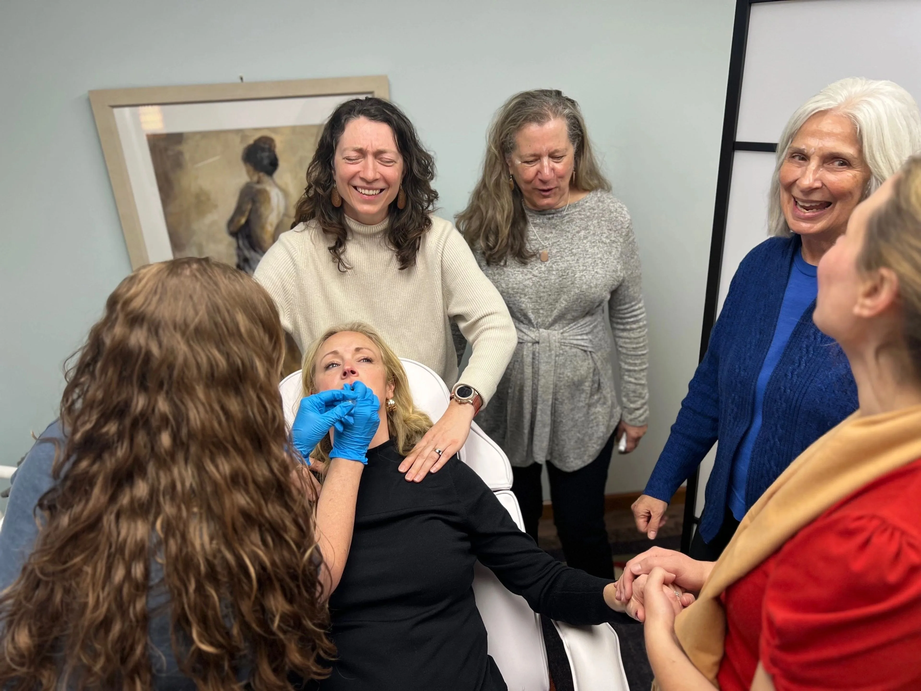 Women gathered for a treatment party at the clinic.