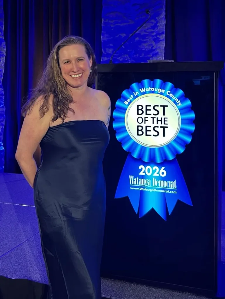 Dr. Tracy Parrish beside the Best of the Best 2026 award ribbon from the Watauga Democrat.